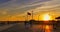 Sunset on Boardwalk with Red Orange Clouds