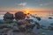 Sunset in Bornholm island in rocky beach