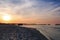 Sunset and breakwaters on the Baltic Sea