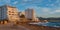 Sunset on the Cafes on Ibiza beaches. Golden glow as the sun goes down in St Antoni de Portmany Balearic Islands, Spain