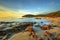 Sunset in Cala Violina bay beach in Maremma, Tuscany. Mediterranean sea. Italy.