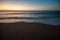 Sunset on calm beach, Sharqiya, Oman