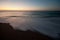 Sunset on calm beach, Sharqiya, Oman