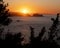 Sunset in the Cantabrian Sea, coast of Gipuzkoa with the sun hiding behind Getaria, Euskadi