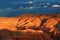 Sunset in the canyon, sunrays on the mountains, erosion, plateau, cloudy