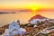 The sunset from the castle above the village of Plaka in Milos, Greece