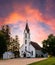 Sunset casts a golden hue on the Saint John Lutheran Church in Farmersburg