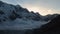 Sunset clouds move between mountains - Elbrus area. Time-lapse