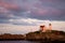 Sunset Clouds Over Nubble Lighthouse in Maine