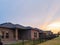 Sunset clouds over a residence building