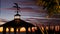 Sunset cloudscape, gazebo on beach, twilight dusk, dramatic sky. Alcove and vane