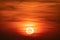 Sunset with crypto currency Bitcoin symbol on the Sun. Falling c
