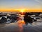 Sunset Crystal Cove California rocks reflections golden