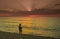 Sunset at cuban beach with tourist