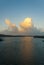 Sunset cumulus clouds on tropical horizon