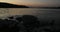 Sunset at Danube river, water and rocks