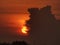 Sunset and dark cloud nearby fish pond