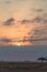 Sunset in dark clouds. Amboseli, Kenya