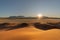 Sunset in desert landscape with mountains, NamibRand Nature Reserve, Namib, Namibia, Africa