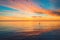 Sunset with dramatic clouds over sea lake and flying seagulls and water ducks in the sky