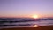 Sunset at Dunas Douradas beach seascape, destination in Algarve, Portugal.