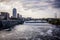 Sunset dusk view of Minneapolis Minnesota skyline as seen from the Mississippi River.