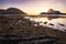 Sunset on El Nido village with silhouette of tropical islands in background. Palawan, Philippines