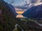 sunset at the end of the fjord with beautiful views of the Norwegian mountains and water, trip with van, photo taken with drone