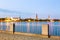 Sunset evening view of Riga cityline panorama over river Daugava with all landmarks of old town. View from Daugava quay.