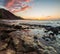 Sunset on The Exposed Lava Reef of Oneuli Beach