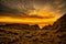 Sunset on the extreme rocky foreshore at Cape Palliser Wairarapa New Zealand