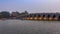 Sunset at the famous 17 arch lion bridge on Kunming Lake by Summer Palace in Beijing China