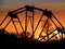 Sunset through the ferris wheel