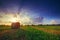 Sunset field, tree and hay bale made by HDR