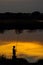 Sunset fisherman silhouette landscape