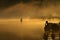 Sunset fishing in fog