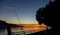 Sunset. Fishing Rod. Silhouette. Geneva Lake. Sky Scape