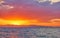 Sunset of flamboyant colours over the sea