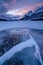 Sunset on a frozen lake in Kananaskis Country in the Canadian Rocky Mountains, Albeta