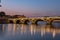 Sunset in the Garonne river and its bridges in Toulouse in Haute-Garonne, Occitania, France