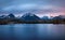 Sunset about glacial lake named Strbske Pleso in National Park H