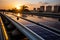 Sunset glow over houses featuring solar panels on rooftops in a residential area