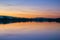 After sunset glow reflected on a lake surface, Shoreline Park, Mountain View, San Francisco bay area, California