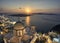 Sunset on greek island Santorini, capital Fira