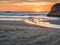 Sunset with gulls on beach
