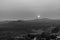 Sunset at hampi over the boulders mountains - Black and White