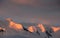 Sunset highlights on steep mountain ridges