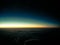 Sunset in the horizontal line on an airplane