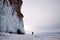 Sunset. Ice splashes on frozen rocks of West coast of Olkhon Island and Strait Small Sea of Lake Baikal