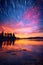 sunset with idyllic purple and pink dramatic clouds over lake water, gorgeous sunrise over pond